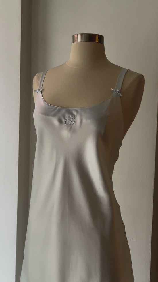 Load and play video in Gallery viewer, Vintage Christian Dior Bleu Satin Slip Dress

